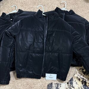 ZYIA Women’s Chamonix Velvet Puffy Coat looks live velvet, but it is not.